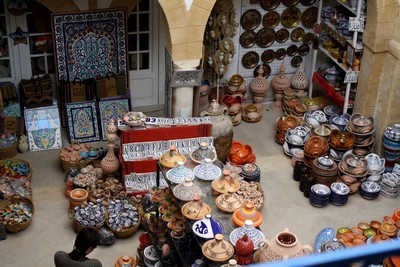 A pottery shop in the medina at Sousse.  The building used to be an old caravanserai and while Jayne was browsing pots a young lad there showed me round the balconey and the old traders' rooms upstairs.  After that he let us up on the roof to see the view.